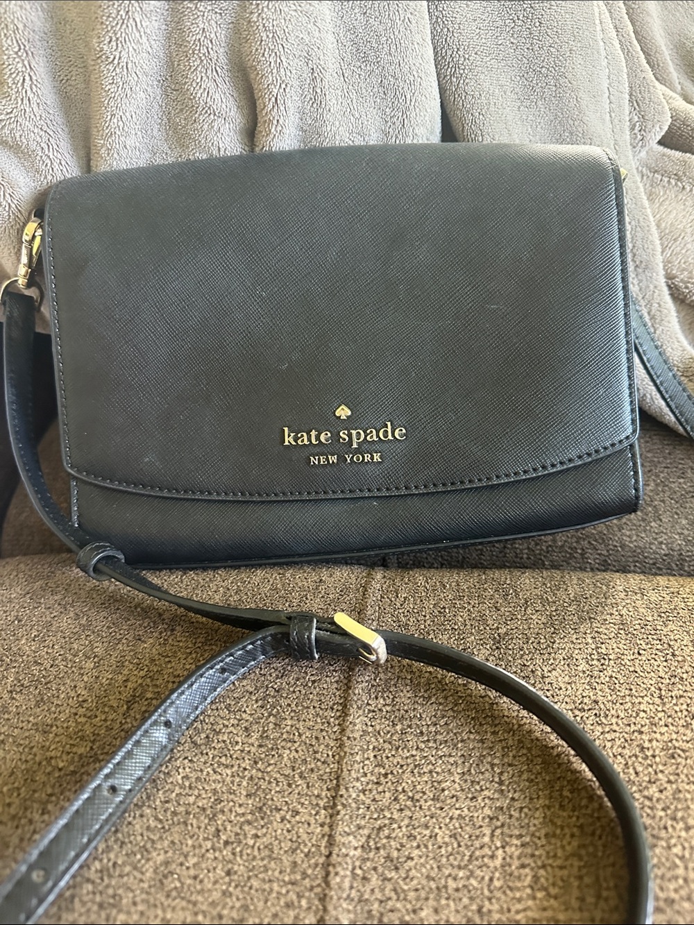 kate spade black leather crossbody with gold logo
